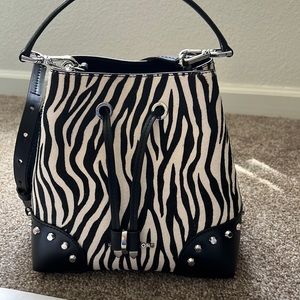 Small convertible bucket bag in zebra haircalf like new
